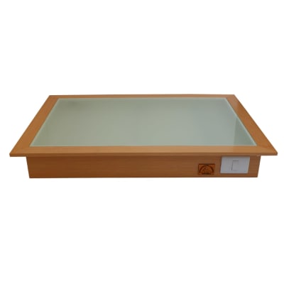 BASE DE LUZ 70X100CM CON VOLADO 80X110CM Y CUBIERTA DE VIDRIO