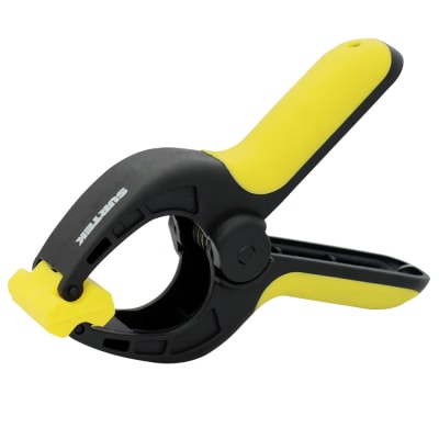 PRENSA PLÁSTICA CON RESORTE DE 6