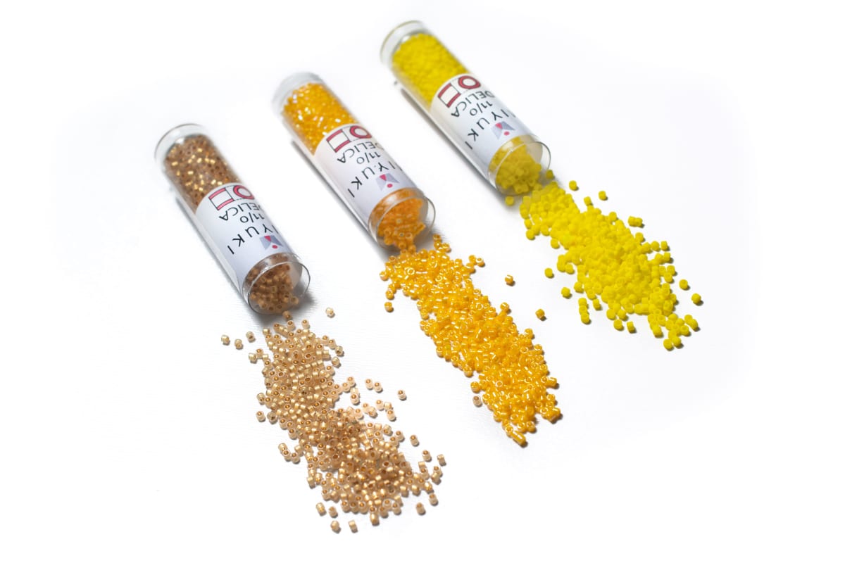 11/0 DELICA HX CUT X 7.2GR/TB AMARILLOS Y DORADOS2