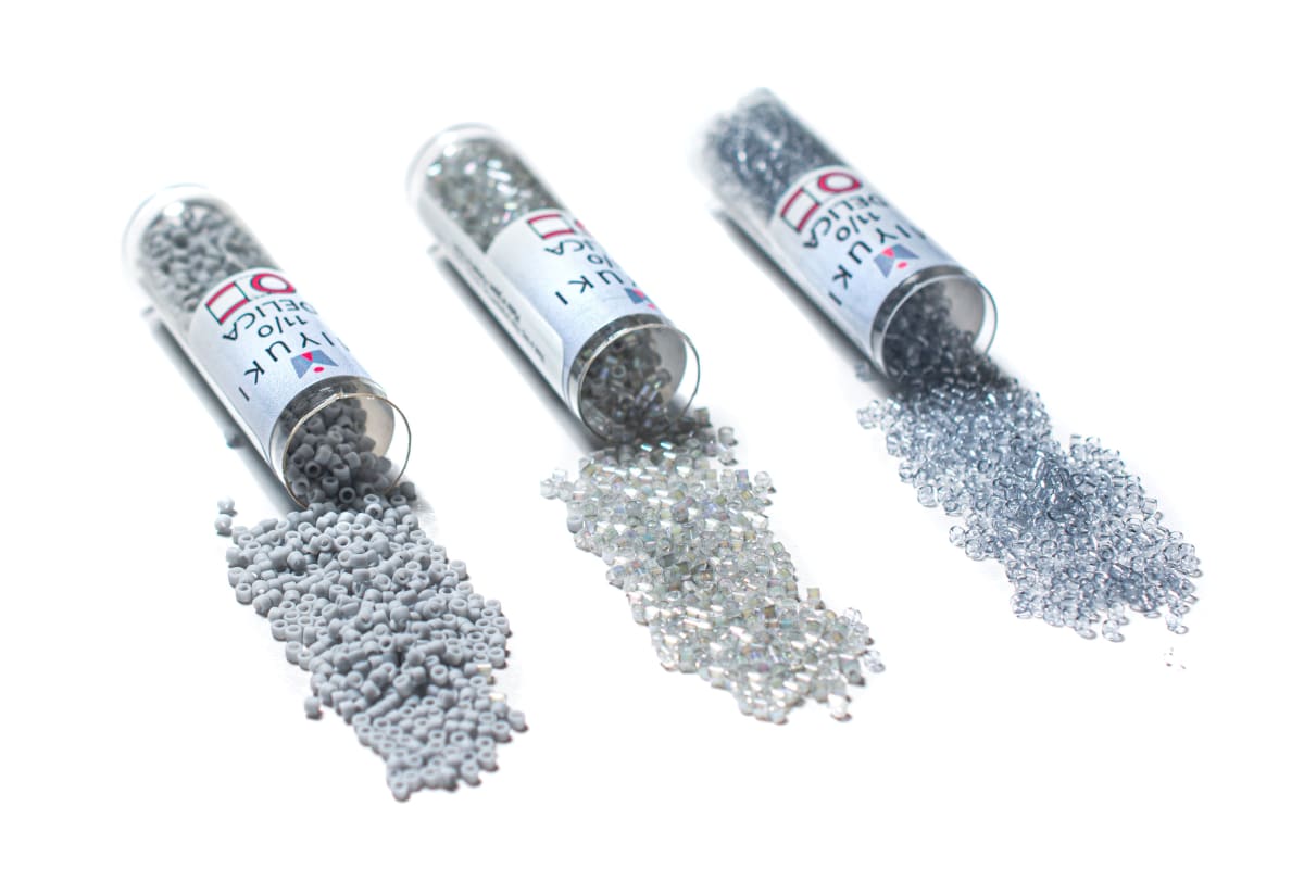 11/0 DELICA X 3GR/TB PLOMOS7