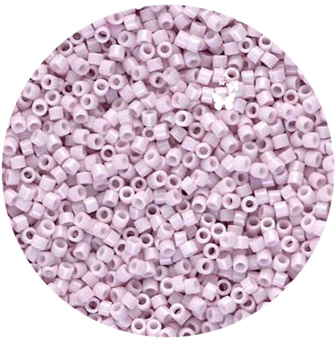 11/0 DELICA X 50GR/BL ROSAS Y FUCSIAS4