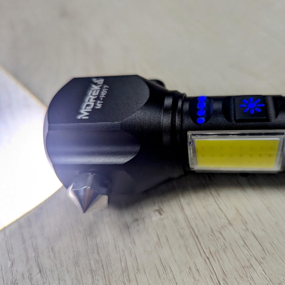 Linterna tactica metalica recargable rompe vidrios iman 7 modos diferentes de luz led Moreka MT-H01710