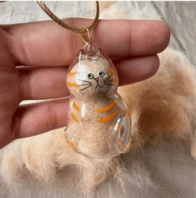Contenedor para el cabello de mi Gato Atigrado