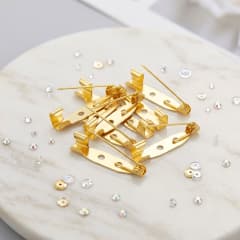 Broche dorado 25 mm 8 unidades