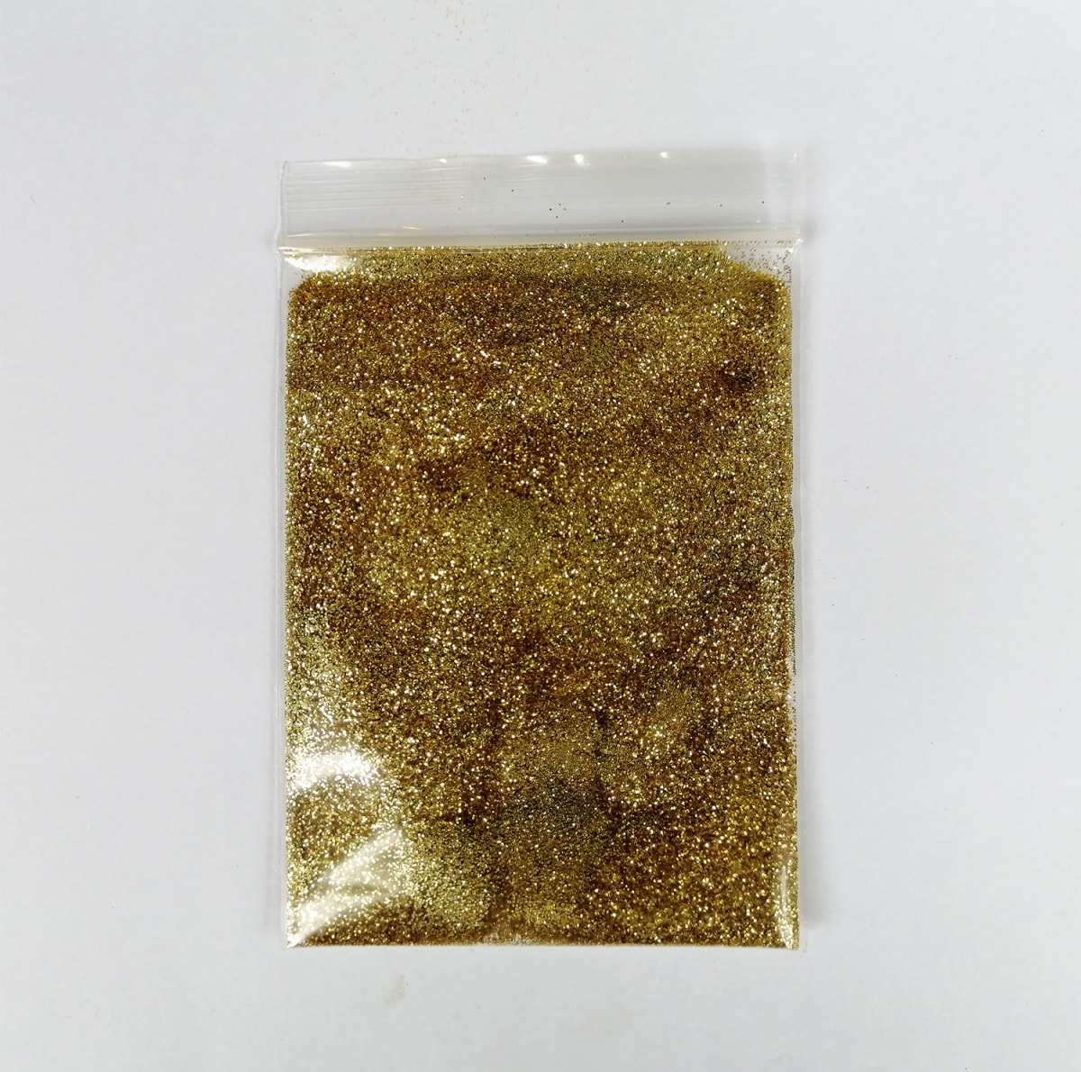 GLITTER REFLEX ORO EN SOBRE1