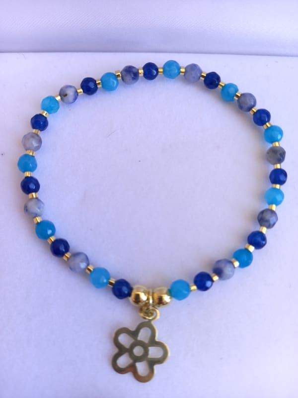 PULSERA PIEDRAS AZULES ORO AMARILLO