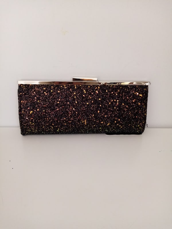 CARTERA DE MANO PARTY INC NEGRA