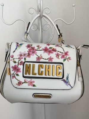 CARTERA NICOLE LEE BLANCA CON FLORES1