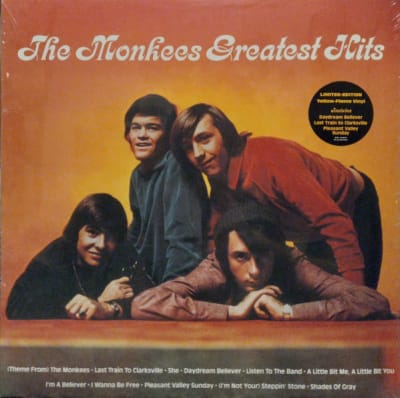 THE MONKEES - GREATEST HITS (VINILO COLOR AMARILLO FLAMA)