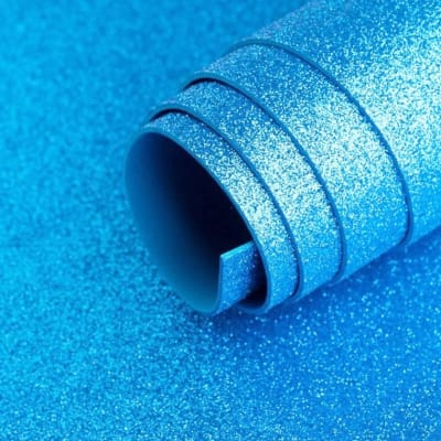 GOMA EVA C/GLITER CELESTE 20X30CM