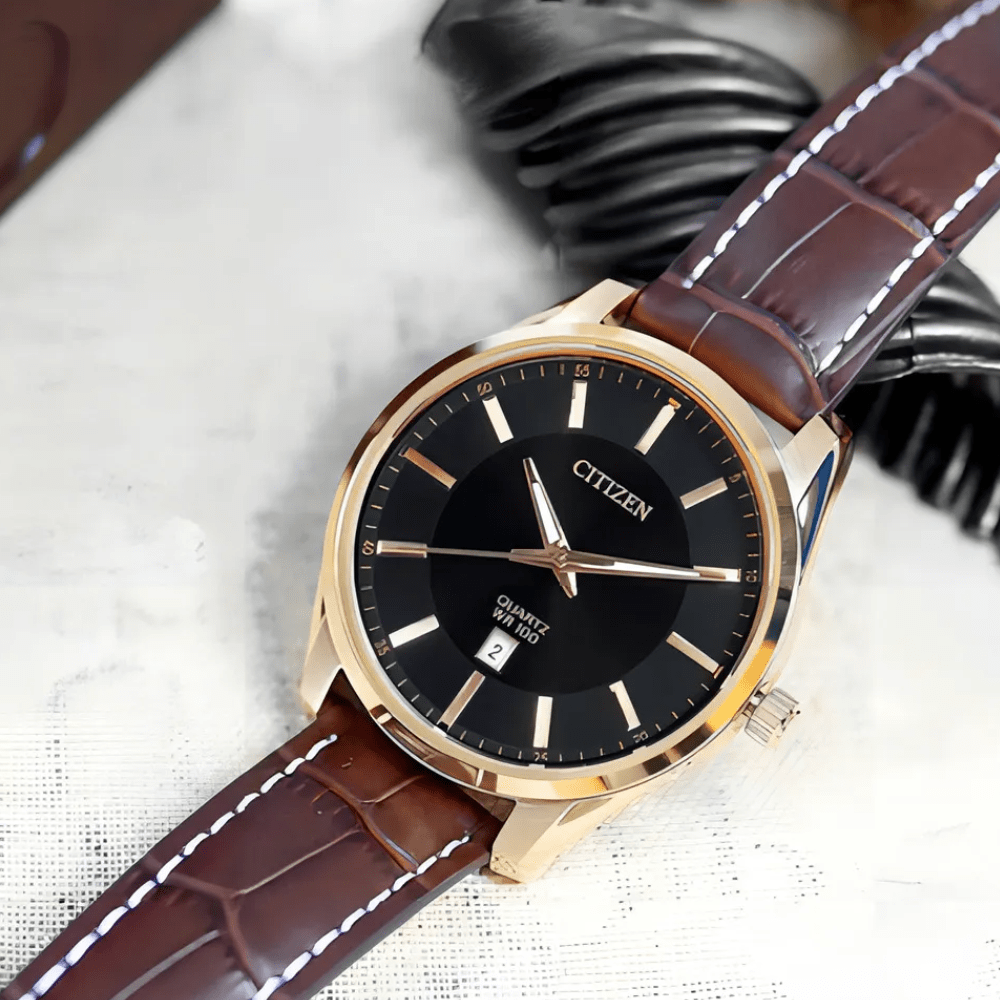 RELOJ CITIZEN BI1033-04E QUARTZ DORADO4