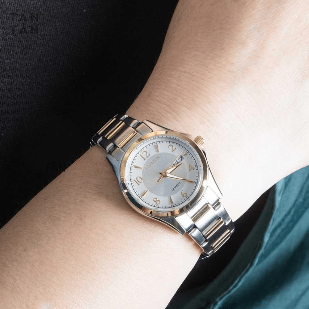 RELOJ CITIZEN EQ0595-55A QUARTZ PLATEADO DORADO2