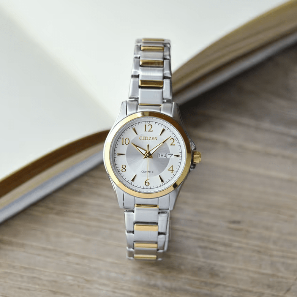 RELOJ CITIZEN EQ0595-55A QUARTZ PLATEADO DORADO4