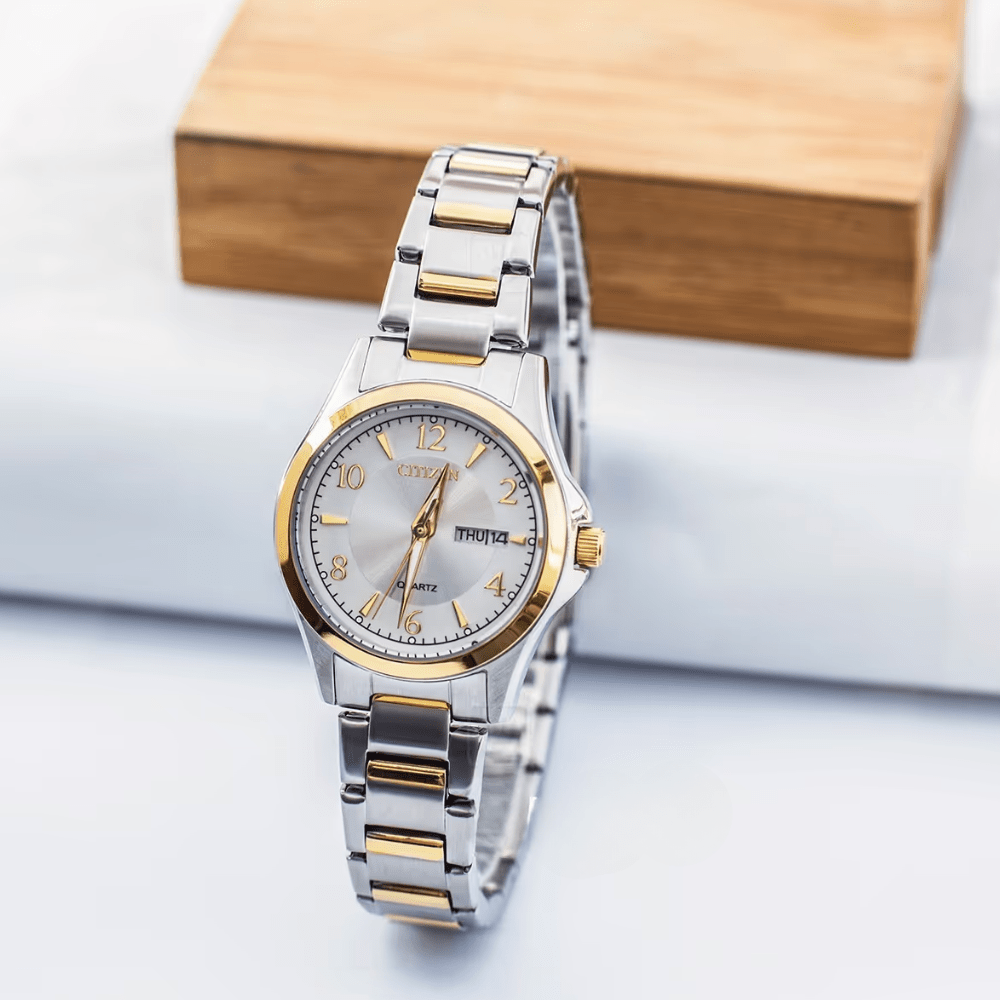 RELOJ CITIZEN EQ0595-55A QUARTZ PLATEADO DORADO5