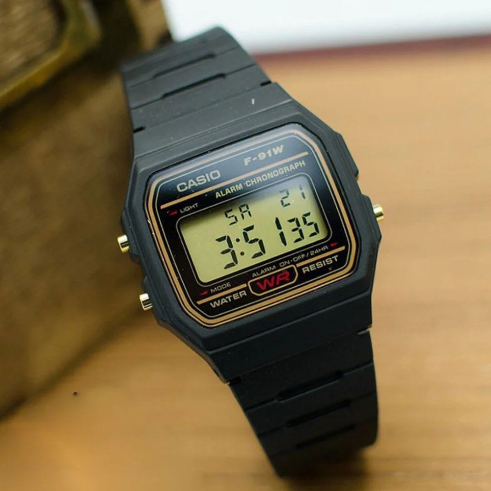 Reloj Casio Vintage F-91WG-9QDF Líneas Doradas Digital Clásico Negro Unisex5