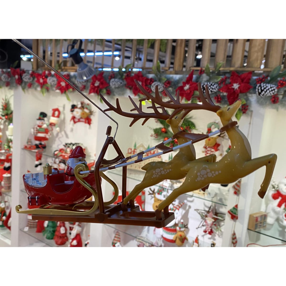 ESTRELLA GIRATORIA PARA ARBOL DE NAVIDAD CON LUCES Y TRINEO2