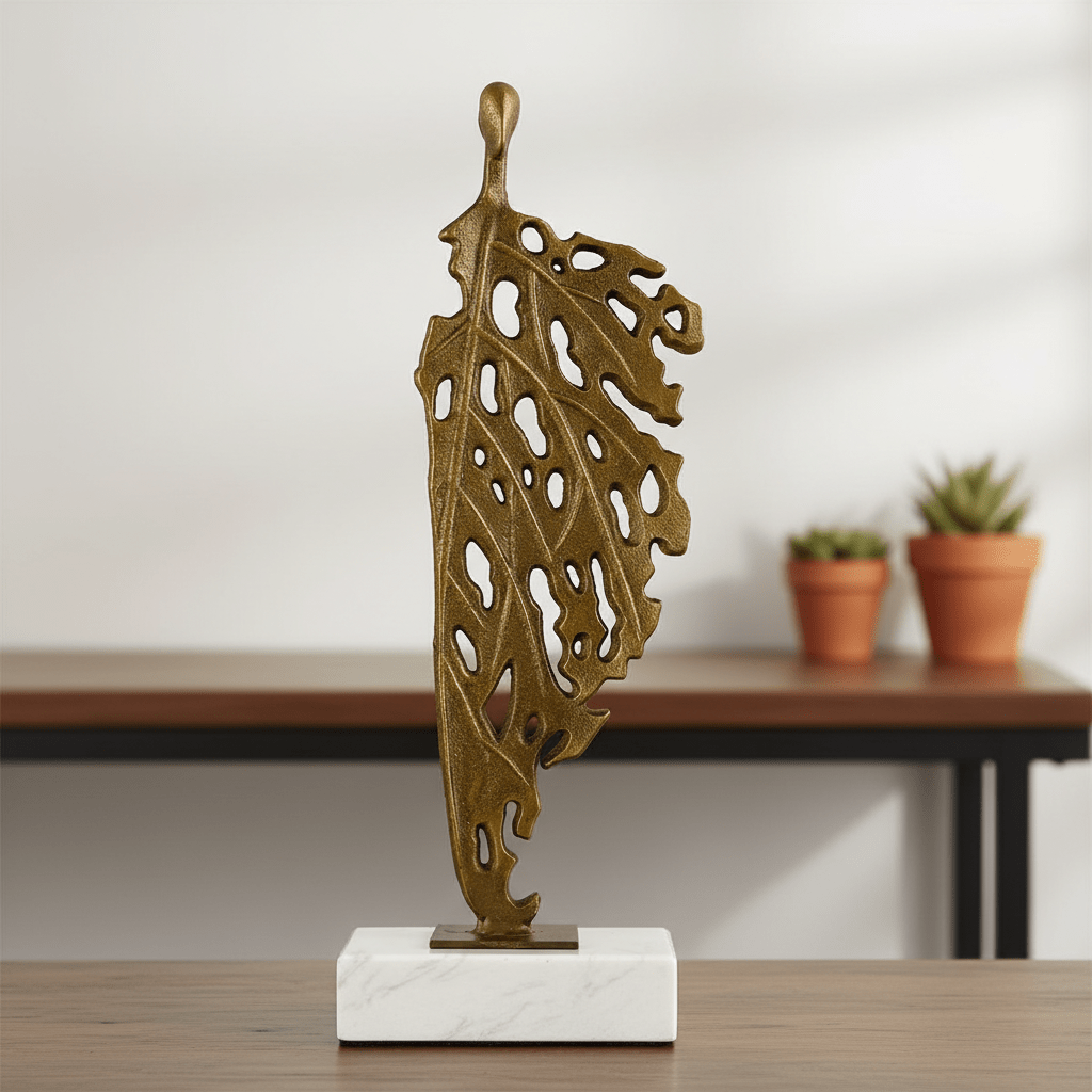 ADORNO ESCULTURA HOMBRE HOJA