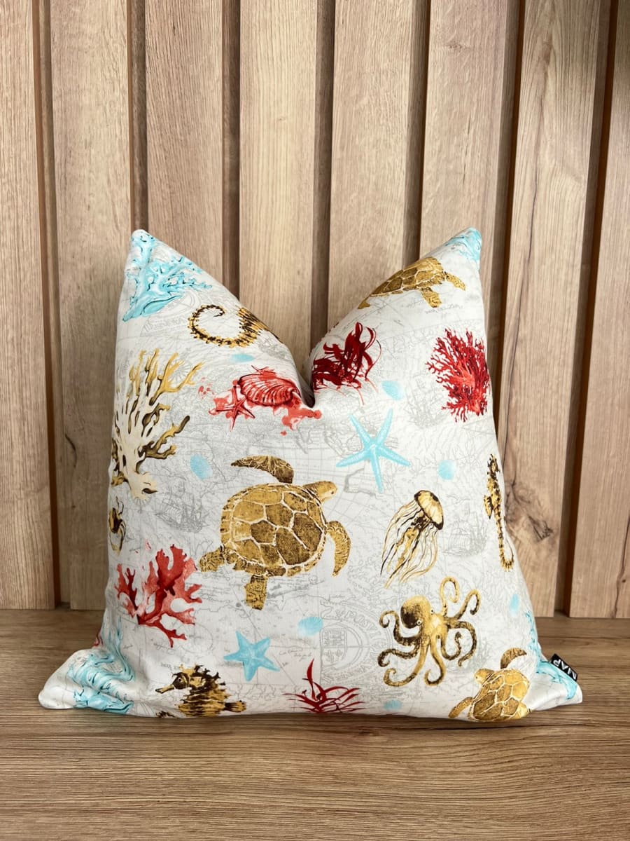 FUNDA DE COJÍN PLAYA TESOROS MARINOS1