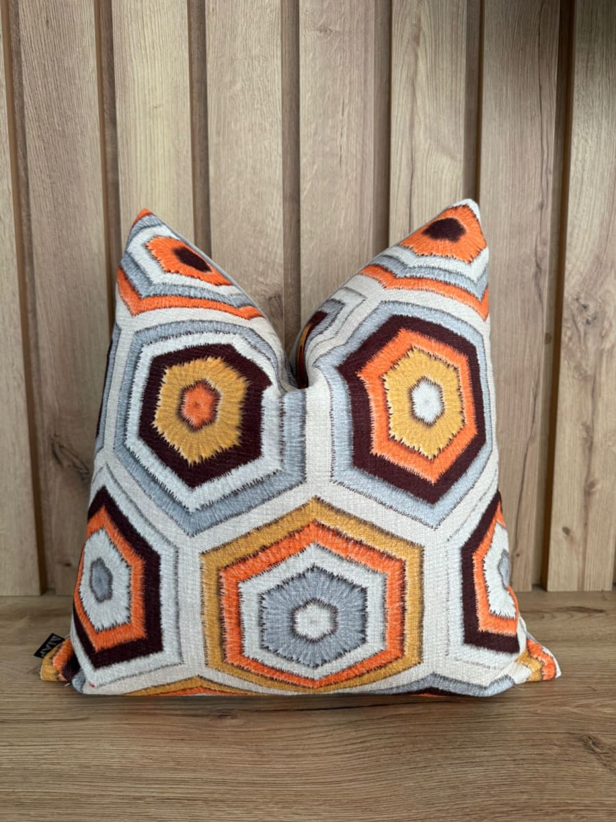 FUNDA DE COJÍN HEXAGONAL VIBRANTE