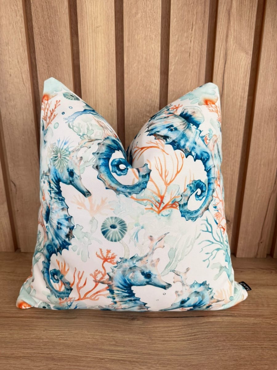 FUNDA DE COJÍN PLAYA CABALLITOS AQUA