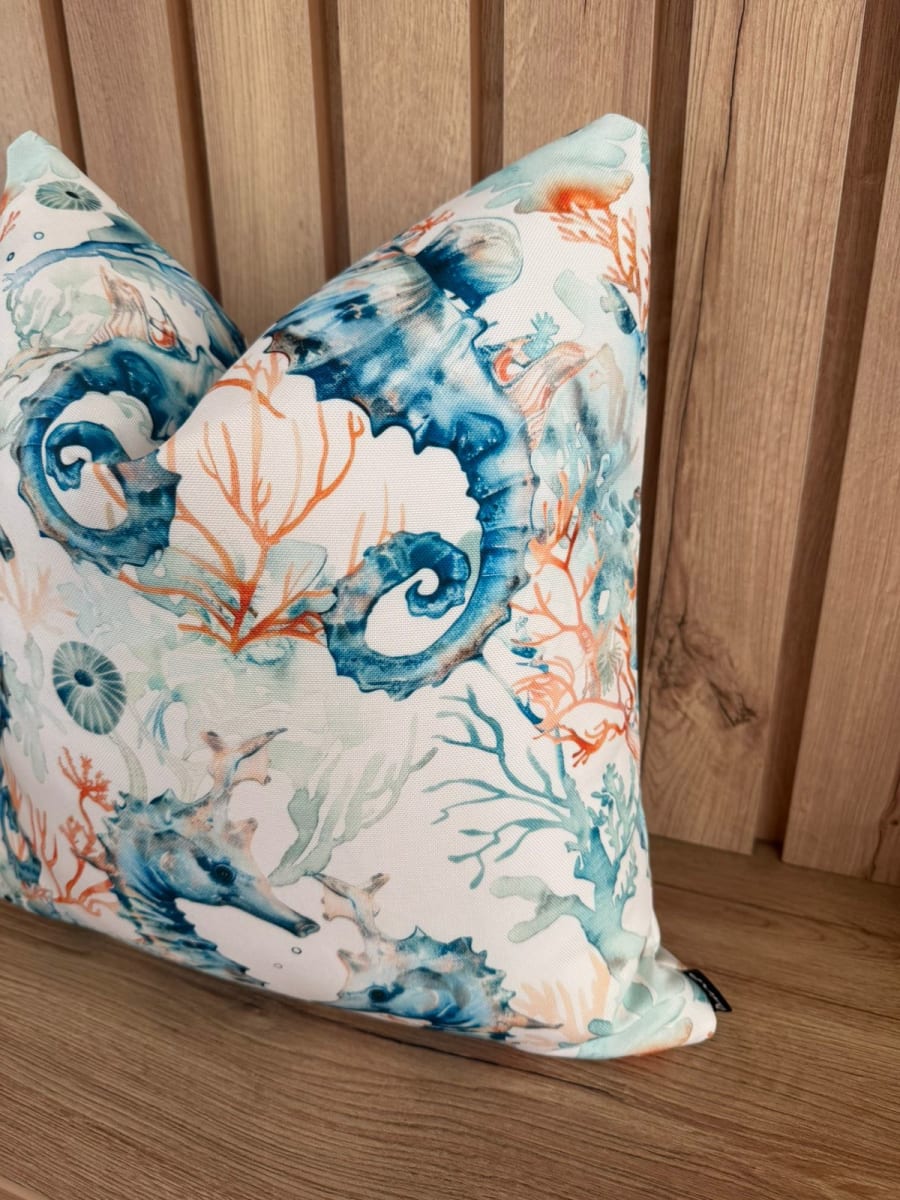 FUNDA DE COJÍN PLAYA CABALLITOS AQUA1