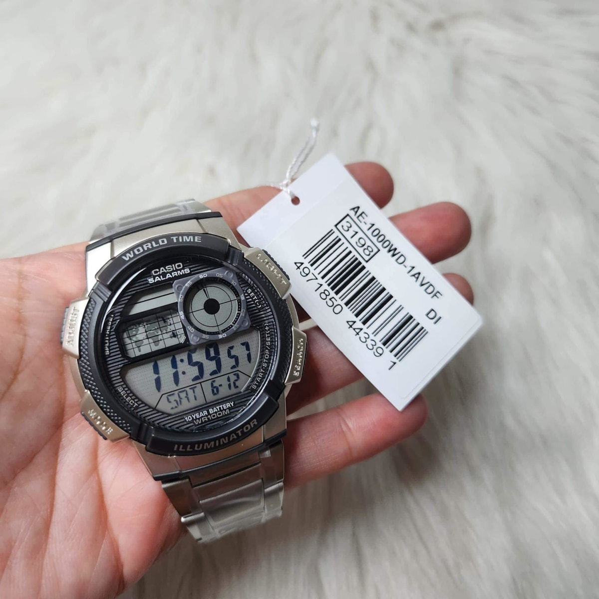 Reloj CASIO Regular AE-1000WD-1A Resina Juvenil Plateado5