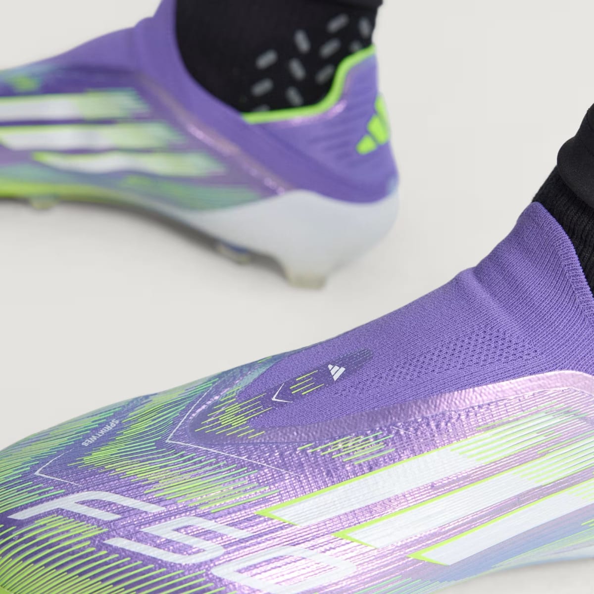 Zapato de Fútbol Adidas terreno firme sin cordones F50 Elite Purple Rush / Cloud White / Lucid Lemon6