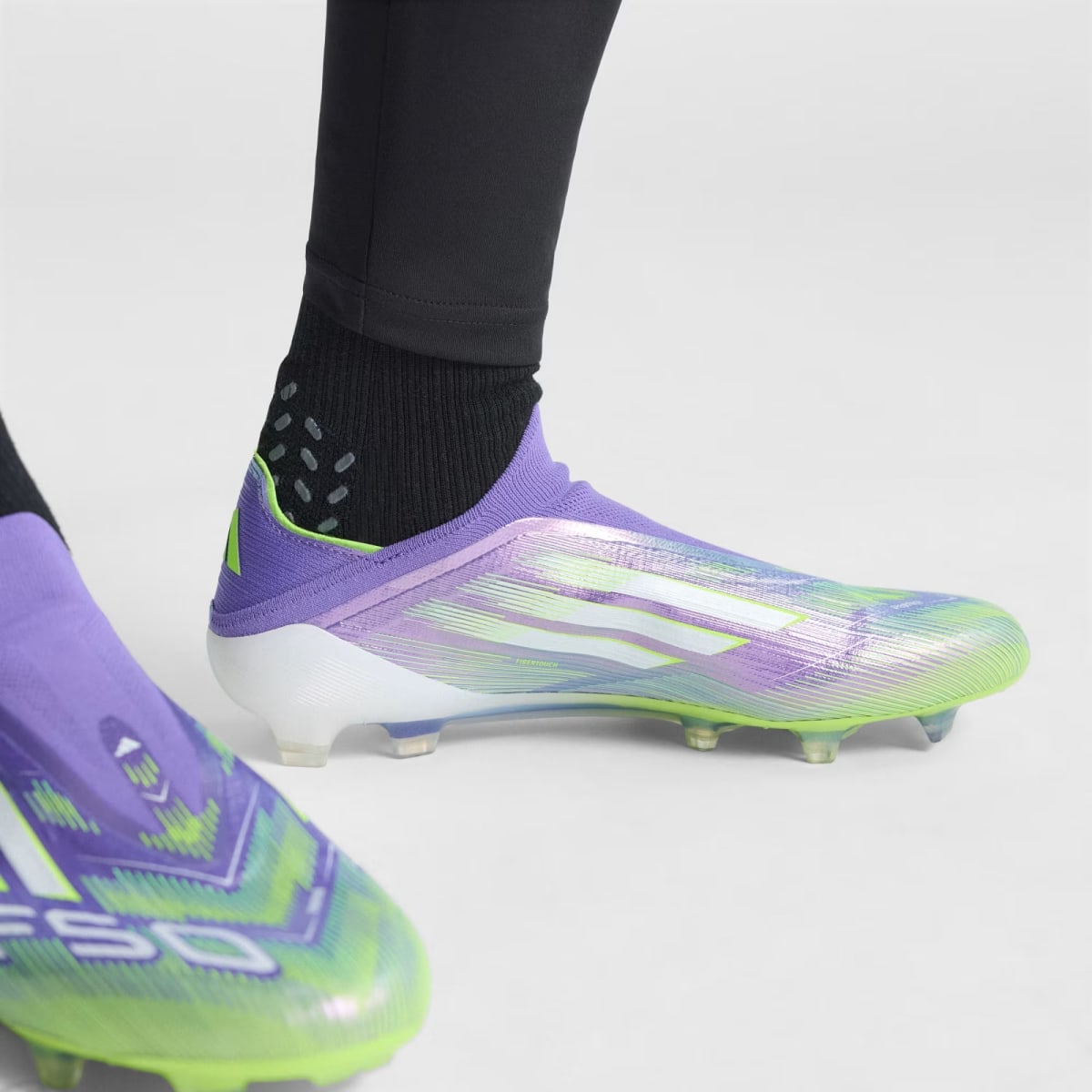 Zapato de Fútbol Adidas terreno firme sin cordones F50 Elite Purple Rush / Cloud White / Lucid Lemon10