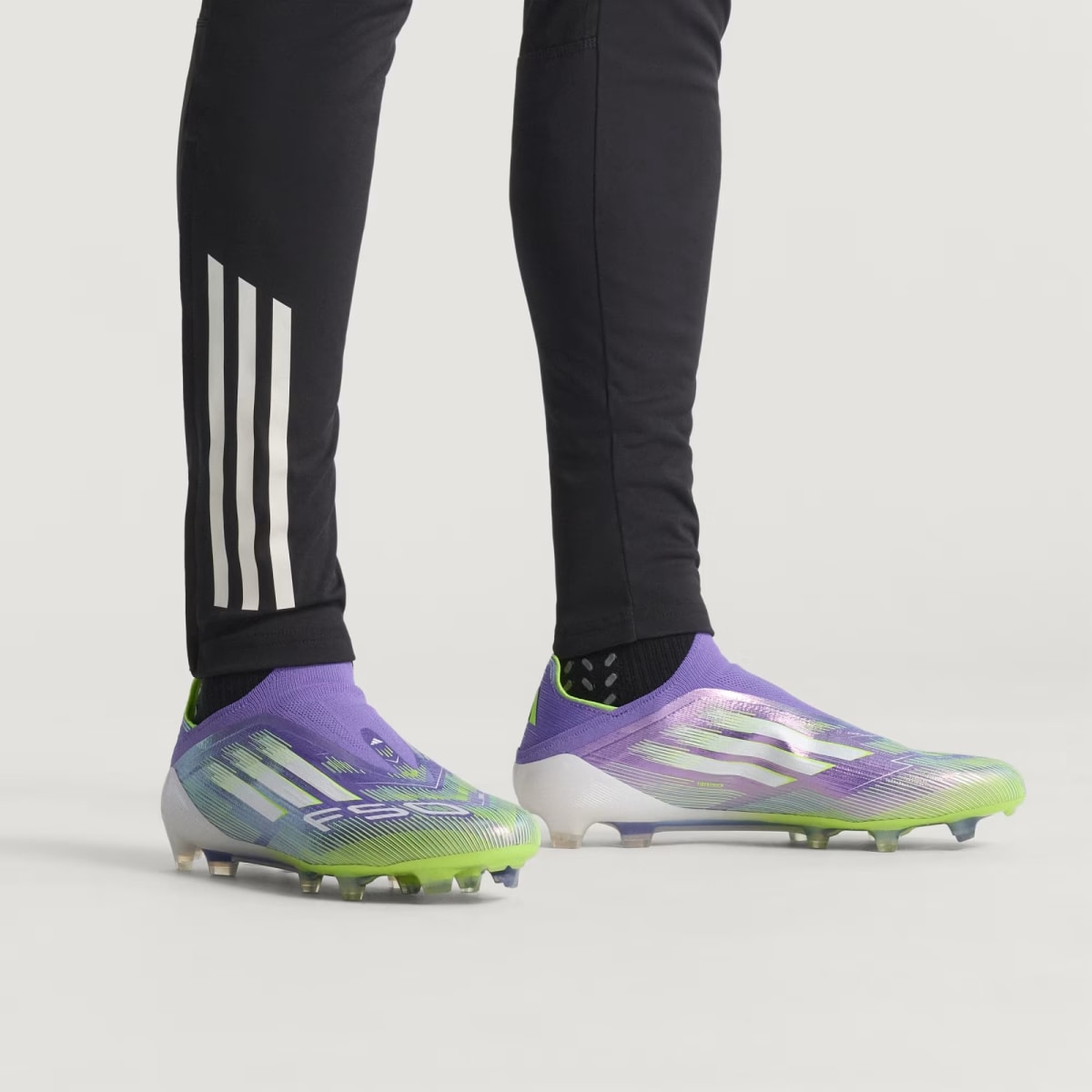 Zapato de Fútbol Adidas terreno firme sin cordones F50 Elite Purple Rush / Cloud White / Lucid Lemon2